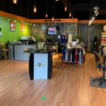 Big Frog Custom T-Shirts & More of Asheville store showcasing diverse clothing and accessories for all tastes and styles.